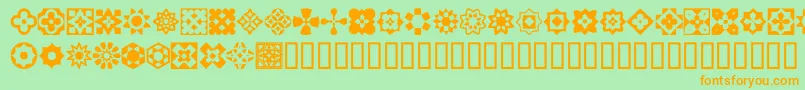 Fonte ItalianMosaicOrnaments – fontes laranjas em um fundo verde