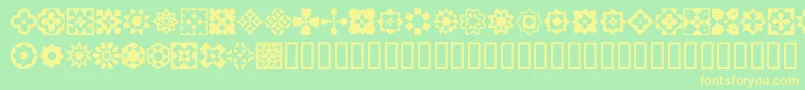 ItalianMosaicOrnaments Font – Yellow Fonts on Green Background