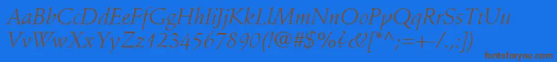 StempelSchneidlerLtLightItalic-Schriftart – Braune Schriften auf blauem Hintergrund