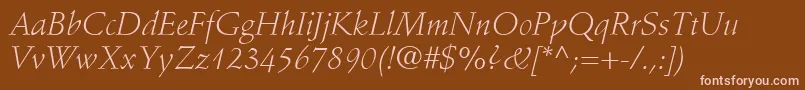Fonte StempelSchneidlerLtLightItalic – fontes rosa em um fundo marrom