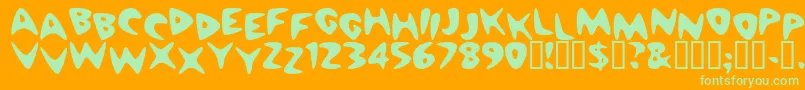 Cheapmot-fontti – vihreät fontit oranssilla taustalla