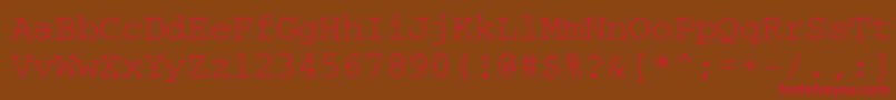フォントCourierisoctt – 赤い文字が茶色の背景にあります。