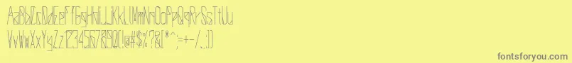 Fonte DeltaUniverse – fontes cinzas em um fundo amarelo