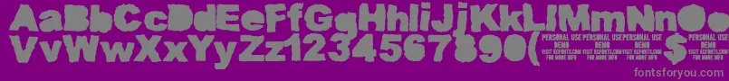 MuddytractorsoliddemoKcfonts Font – Gray Fonts on Purple Background