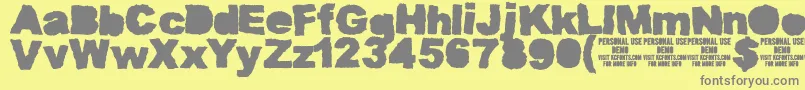 Шрифт MuddytractorsoliddemoKcfonts – серые шрифты на жёлтом фоне