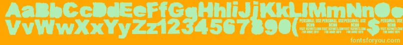 MuddytractorsoliddemoKcfonts-Schriftart – Grüne Schriften auf orangefarbenem Hintergrund