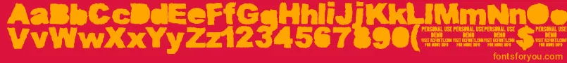 MuddytractorsoliddemoKcfonts Font – Orange Fonts on Red Background
