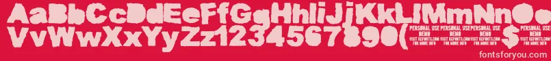 MuddytractorsoliddemoKcfonts Font – Pink Fonts on Red Background