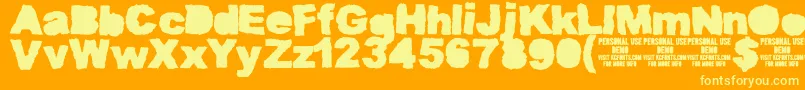 MuddytractorsoliddemoKcfonts Font – Yellow Fonts on Orange Background