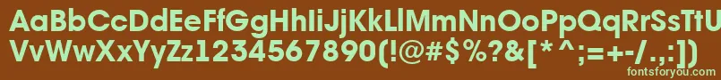 フォントAAvantebsExtrabold – 緑色の文字が茶色の背景にあります。