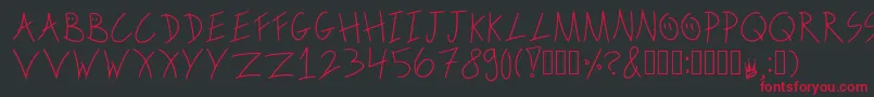 Czcionka ScribbleonthebusRegular – czerwone czcionki na czarnym tle