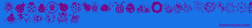 LadybugDings-Schriftart – Violette Schriften auf blauem Hintergrund