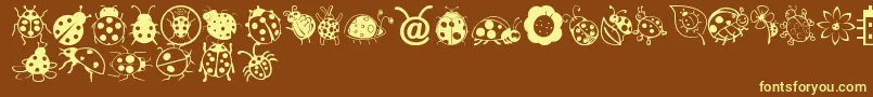 LadybugDings Font – Yellow Fonts on Brown Background