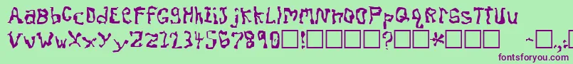 DissonantFractured Font – Purple Fonts on Green Background