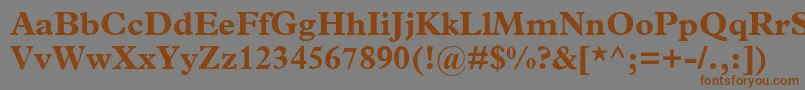 フォントMplantinBold – 茶色の文字が灰色の背景にあります。