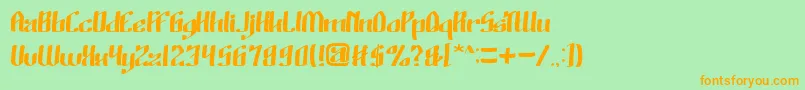 フォントWinoSutarminKadir – オレンジの文字が緑の背景にあります。