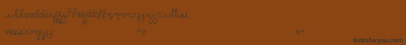 LittleBliss Font – Black Fonts on Brown Background