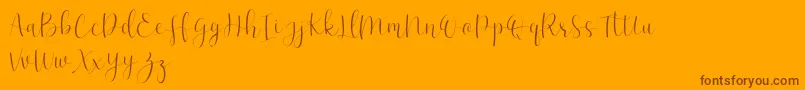 EffortTtf-Schriftart – Braune Schriften auf orangefarbenem Hintergrund