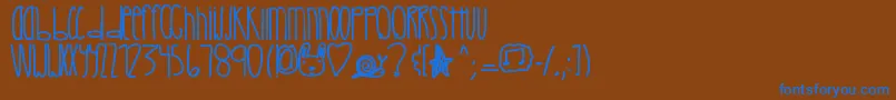 Crystalcastles-fontti – siniset fontit ruskealla taustalla