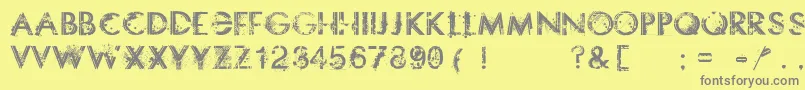 フォントSomethingdangerous – 黄色の背景に灰色の文字