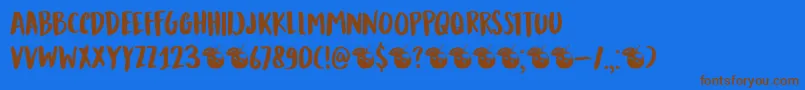 DkMandarinWhispers Font – Brown Fonts on Blue Background