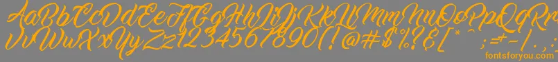 WorkInProgress-Schriftart – Orangefarbene Schriften auf grauem Hintergrund