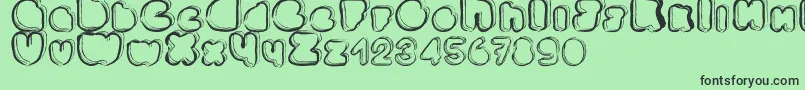 Ponctuation-fontti – mustat fontit vihreällä taustalla