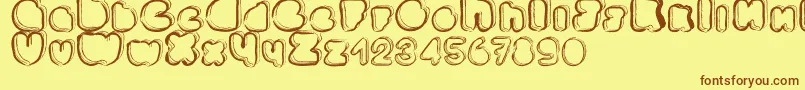 フォントPonctuation – 茶色の文字が黄色の背景にあります。