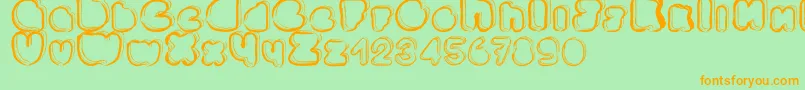 フォントPonctuation – オレンジの文字が緑の背景にあります。
