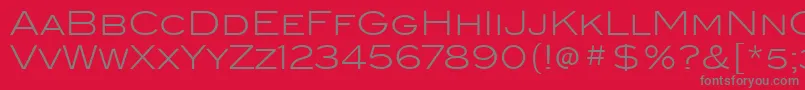 BlairItcLight-Schriftart – Graue Schriften auf rotem Hintergrund