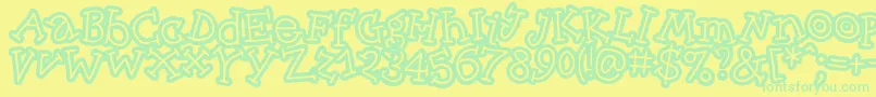Skinnycapkick Font – Green Fonts on Yellow Background
