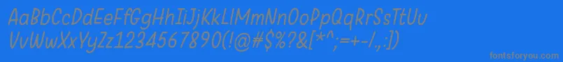 Czcionka WarungKopiLightItalic – szare czcionki na niebieskim tle