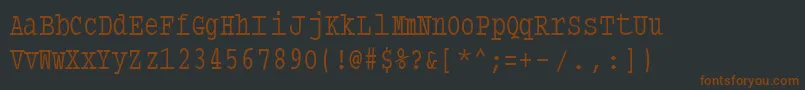 Шрифт Typewritercondensed – коричневые шрифты на чёрном фоне