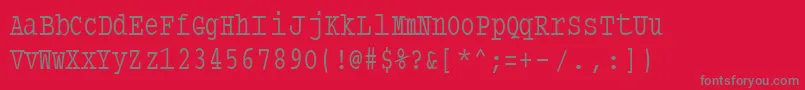 フォントTypewritercondensed – 赤い背景に灰色の文字