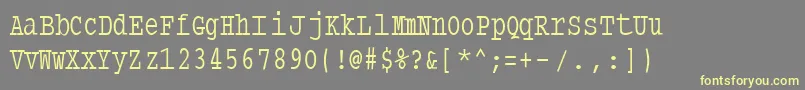 Шрифт Typewritercondensed – жёлтые шрифты на сером фоне