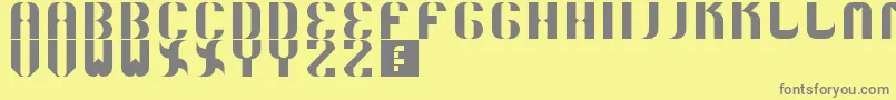 フォント5curvo – 黄色の背景に灰色の文字