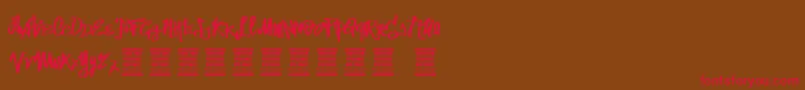 フォントVtksStreetVision – 赤い文字が茶色の背景にあります。