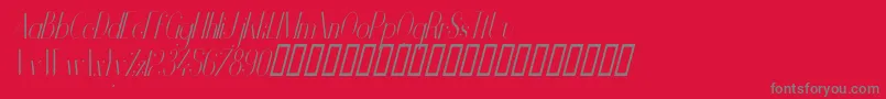 フォントVanityLightNarrowItalic – 赤い背景に灰色の文字