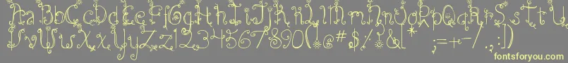 DjbEmilysGarden Font – Yellow Fonts on Gray Background