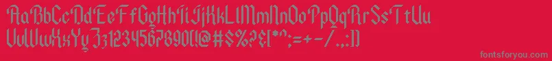 Czcionka AncientModernTales – szare czcionki na czerwonym tle