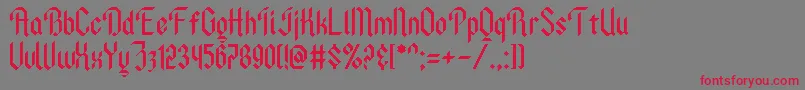 AncientModernTales Font – Red Fonts on Gray Background