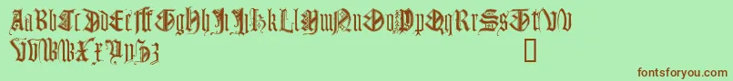 Шрифт MonumentalGothicDemo – коричневые шрифты на зелёном фоне
