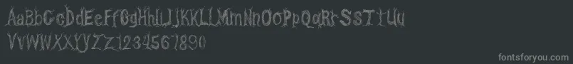 Fonte CfonetwotreesRegular – fontes cinzas em um fundo preto