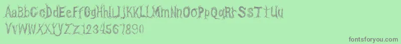 CfonetwotreesRegular Font – Gray Fonts on Green Background