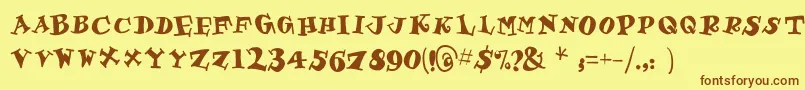 フォントGastronom – 茶色の文字が黄色の背景にあります。