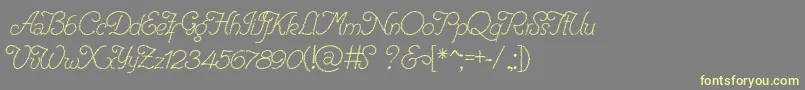 RenaniaTrash Font – Yellow Fonts on Gray Background