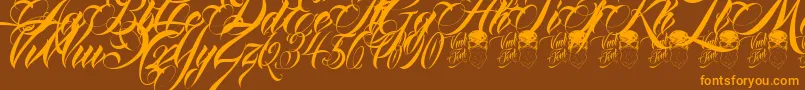 フォントQueenAnhaScript – オレンジ色の文字が茶色の背景にあります。