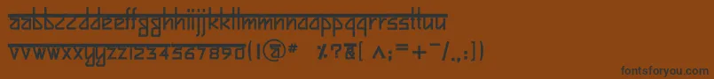 フォントBitlingsujatraBold – 黒い文字が茶色の背景にあります