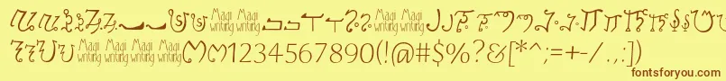 フォントMagiwriting – 茶色の文字が黄色の背景にあります。