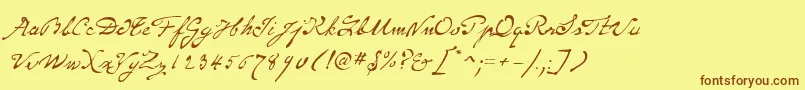 フォントP22MonetRegular – 茶色の文字が黄色の背景にあります。